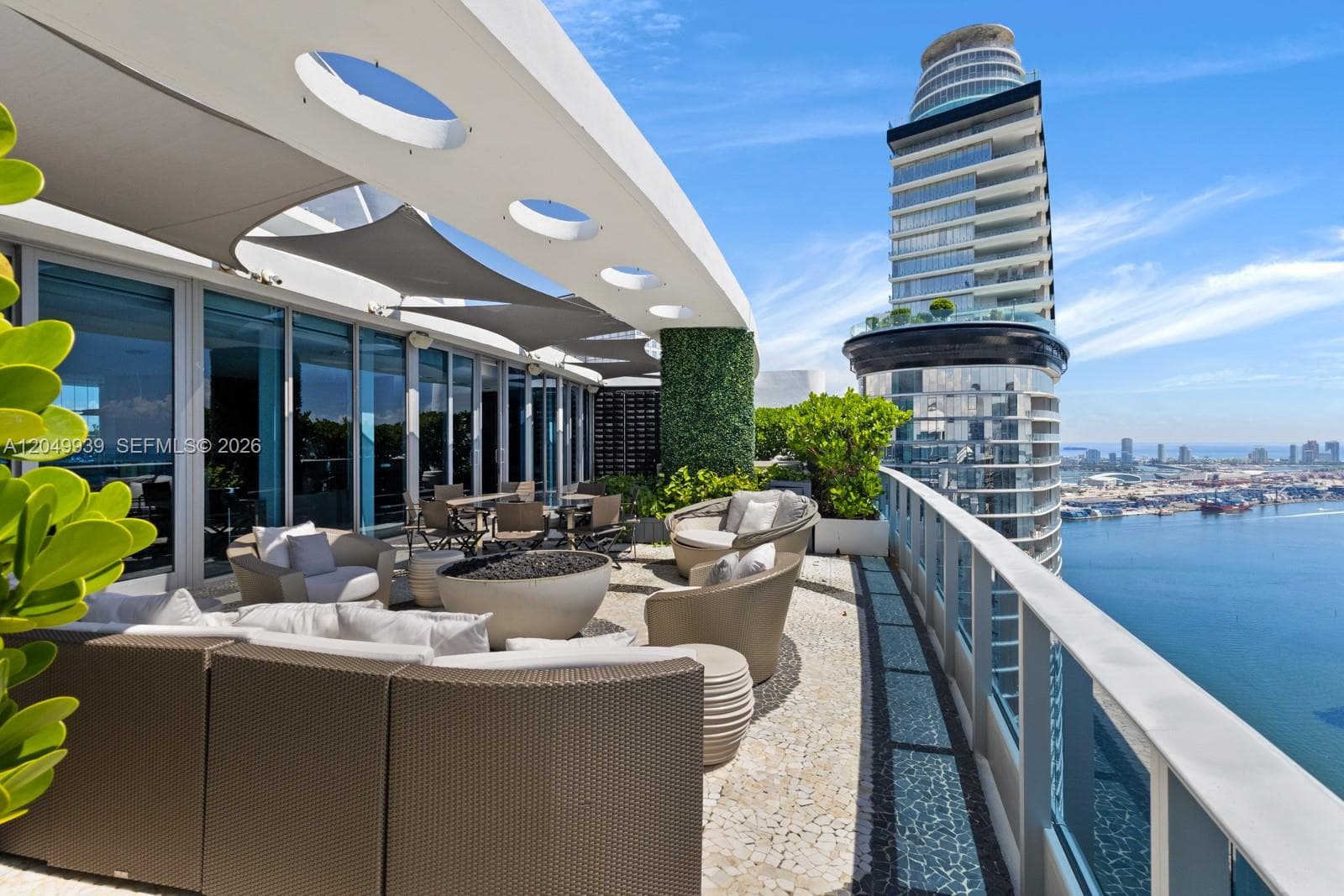 200 Biscayne Boulevard Way penthouse living room with bay and skyline view